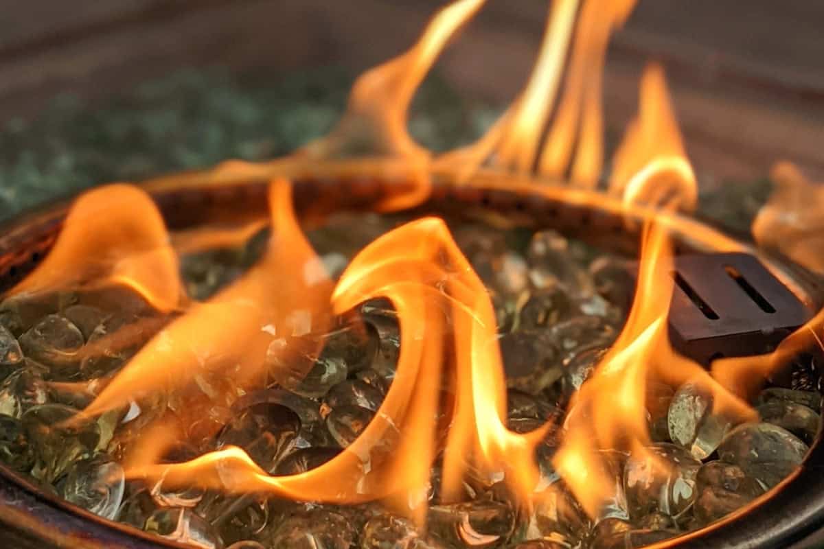 Image of a gas fire pit burner for a blog post answering the question , "do fire pits repel mosquitoes.