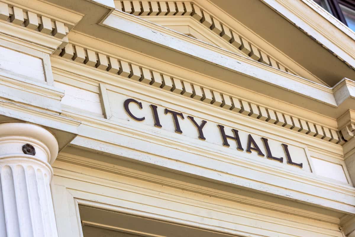 fire-pit-clearance-requirements-faqs Image of the facade of a town's city hall.