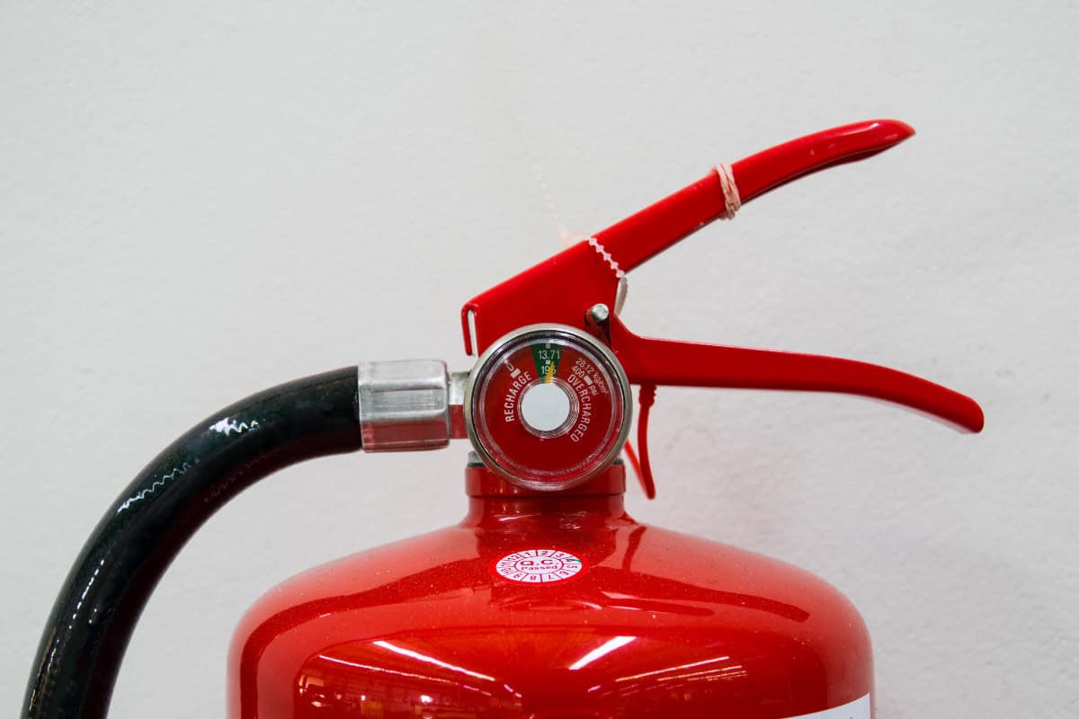 fire-pit-clearance-requirements-tips Image of the top of an ABC class fire extinguisher.