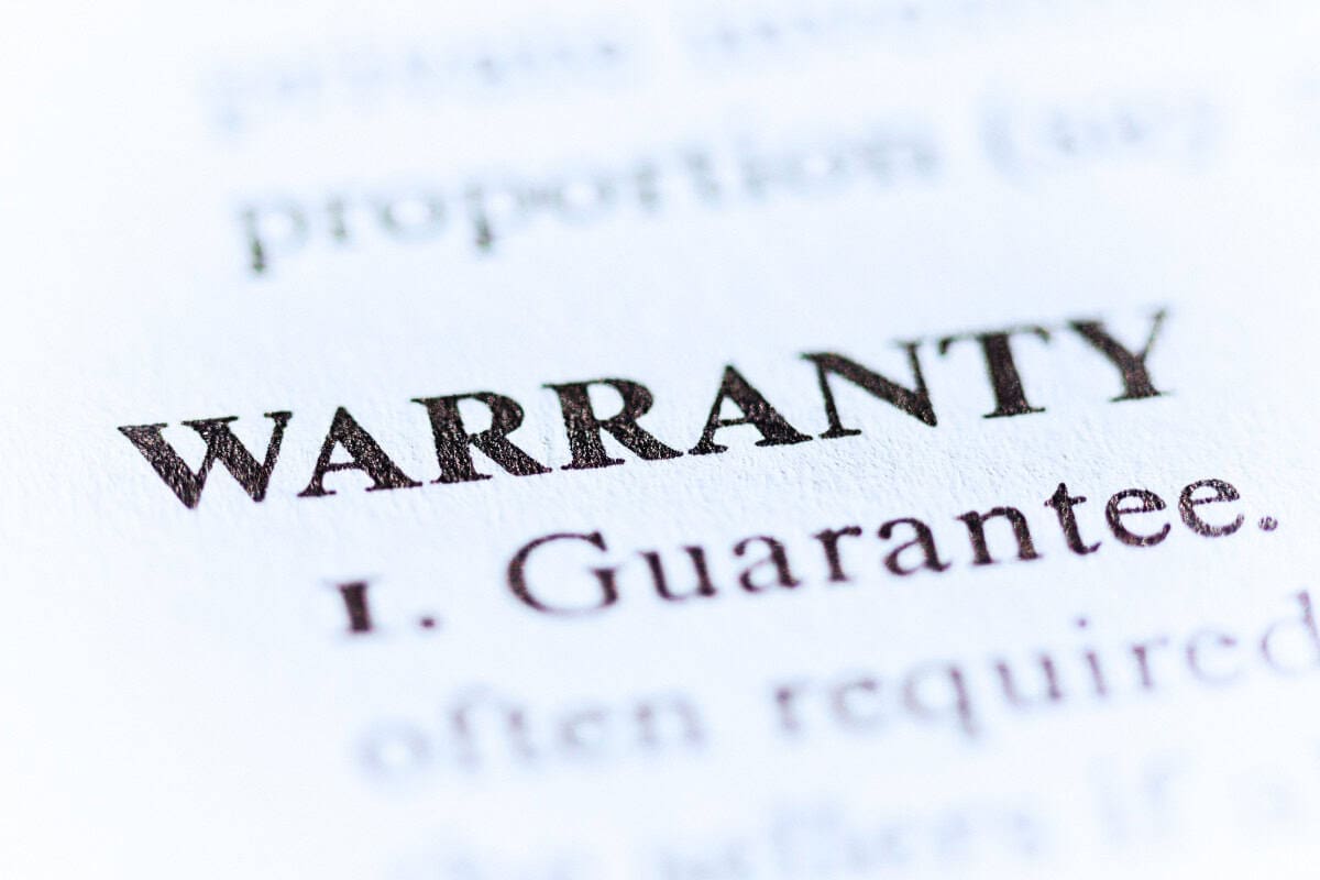 fire-pit-on-decking-faqs Image of the word warranty in a dictionary.