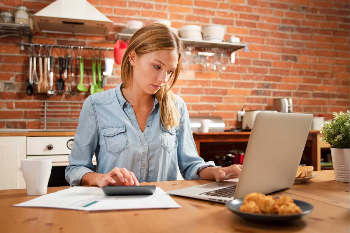 Image of a woman planning her budget.