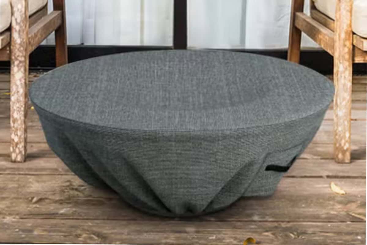 Image of a round gas fire bowl with a cover.