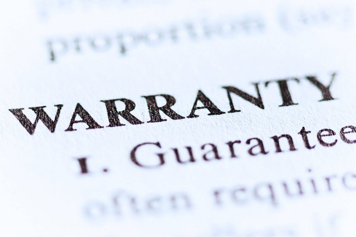 Warranty policy document close-up.